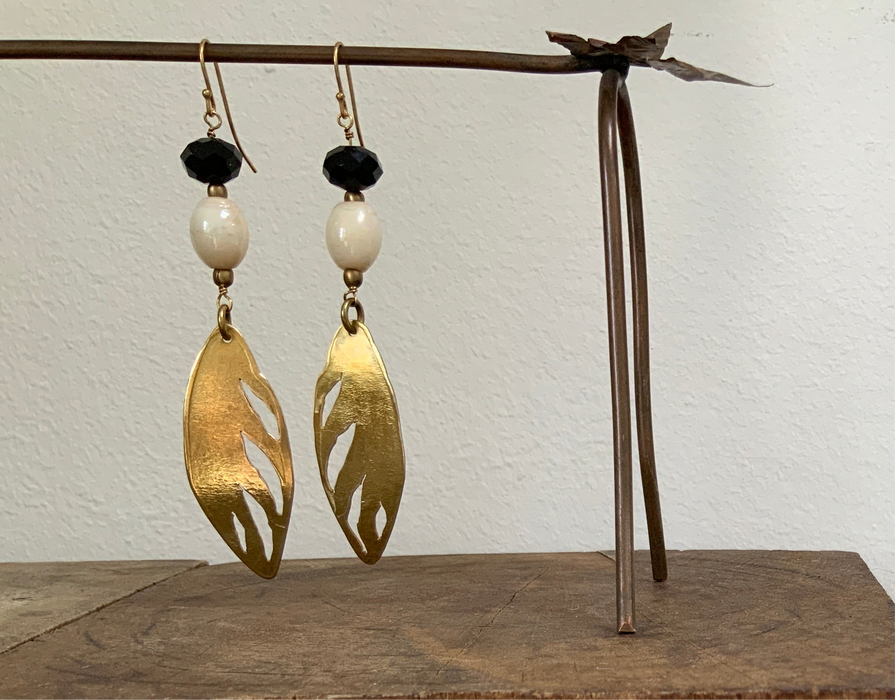 Earrings with glass beads and upcycled brass pendant