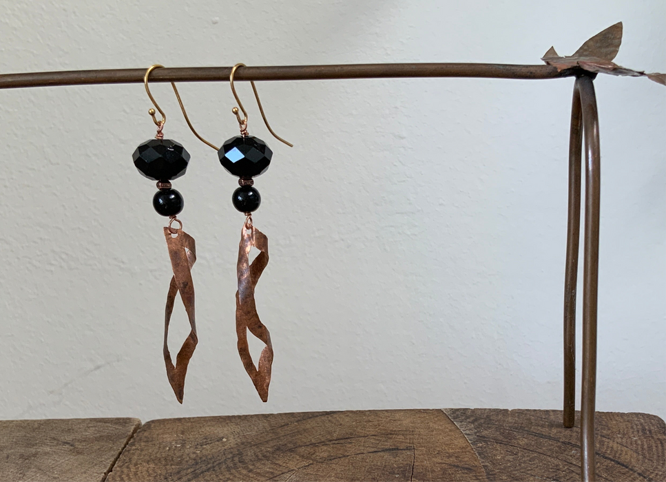 Earrings with twisted, hand-forged copper pendant and glass beads