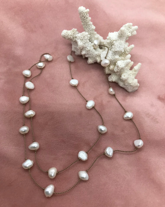 Silk thread necklace with freshwater pearls