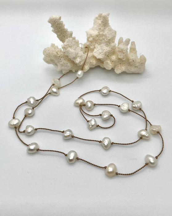 Silk thread necklace with freshwater pearls